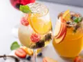 Orzeźwiające drinki z malinami, pomarańczą i miętą. Idealne z czym pić prosecco na letnie popołudnie.